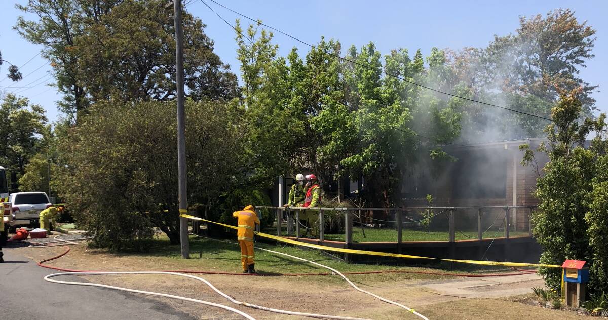Fire crews continue the mop up at the Shoalhaven Heads house fire.