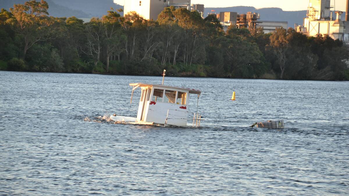 Roads and Maritime Services is organising a contractor to remove the timber boat, The Christine J, which sank in the Shoalhaven River in early February.
