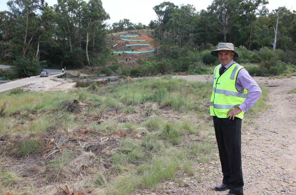 Goulburn Mulwaree Council operations director Matt O'Rourke pictured at the old Oallen Ford bridge in February, 2015 as construction was beginning.