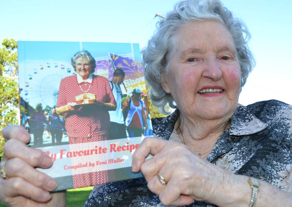 LEGENDARY: Champion Shoalhaven cook Voni Muller with her first book, My Favourite Recipes has sold out 700 copies in a couple of weeks.