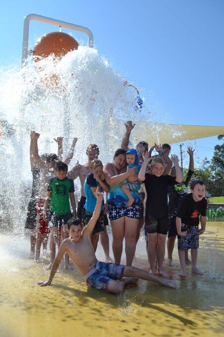 GREAT TIME: The Nowra Aquatic Park opened for the first time over the long weekend with large crowds escaping the heat at the new complex. The splash pad aquatic playground was extremely popular. Photo: Jessica Long