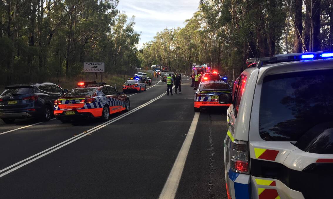 The crash scene on the Princes Highway at Jerrawangala where two people have died following a two car accident. Photo: DAMIAN McGILL 