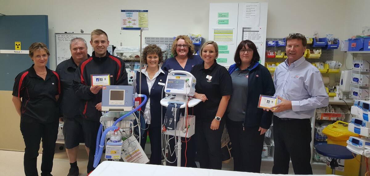 Shoalhaven Hospital Emergency Department Nurse Unit Manager Wendy Fetchet and Clinical Nurse Educator Sharyn Balzer (centre) with IGA representatives Lee Saunders, Les Corish, Nathen Evans, Kerry Bartley, Michelle Corish and Metcash area manager Don Targett with some of the new equipment.
