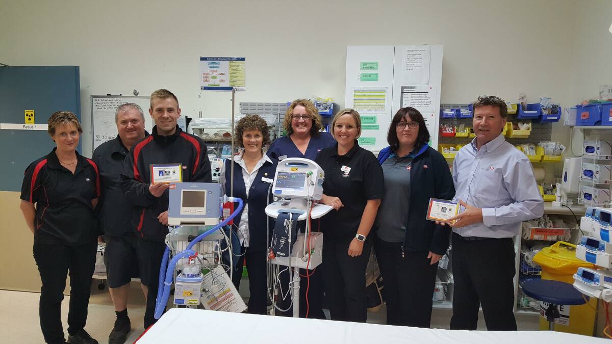  Shoalhaven Hospital Emergency Department Nurse Unit Manager Wendy Fetchet and Clinical Nurse Educator Sharyn Balzer (centre) with IGA representatives Lee Saunders, Les Corish, Nathen Evans, Kerry Bartley, Michelle Corish and Metcash area manager Don Targett with some of the new equipment.