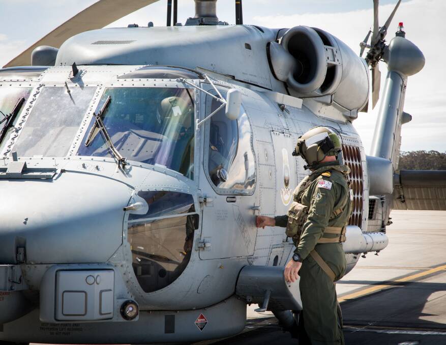 His Royal Highness, Prince Andrew, Duke of York,  prepares for flight in the port side pilot's seat of 816 Squadron's MH-60R Seahawk helicopter. Photo: Bonny Gassner
