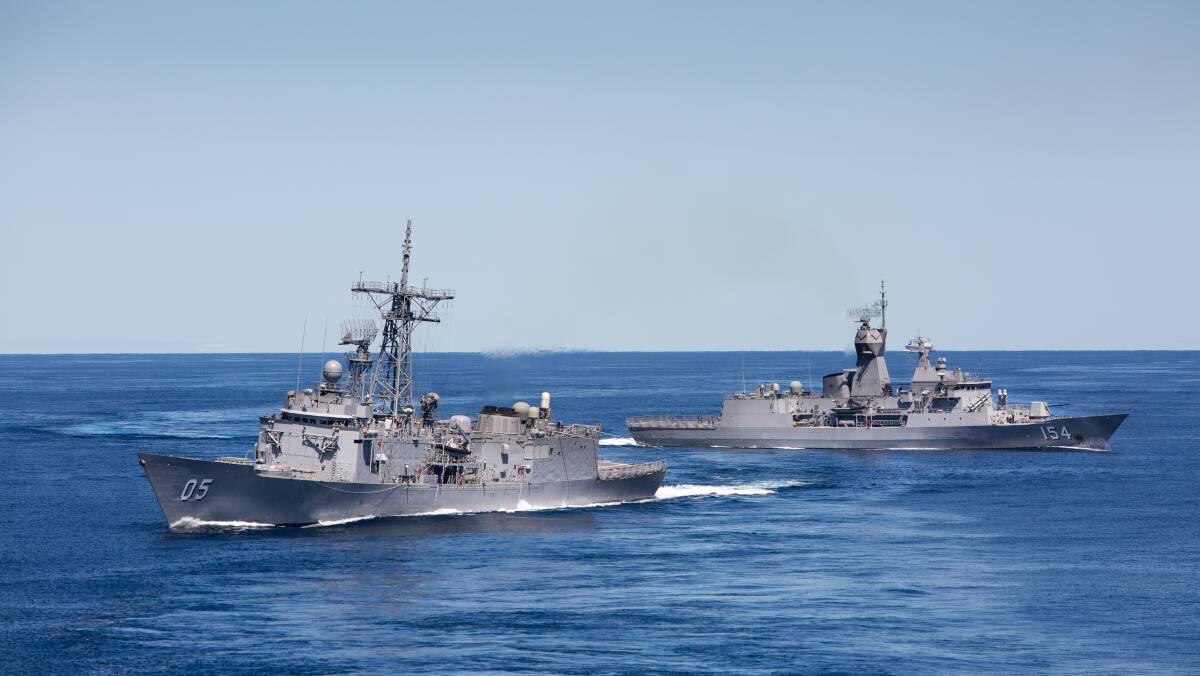 HMA Ships Melbourne and Parramatta conduct manoeuvres in the East Australia Exercise Area at the conclusion of Exercise Ocean Explorer 2018. Photo: Tara Byrne