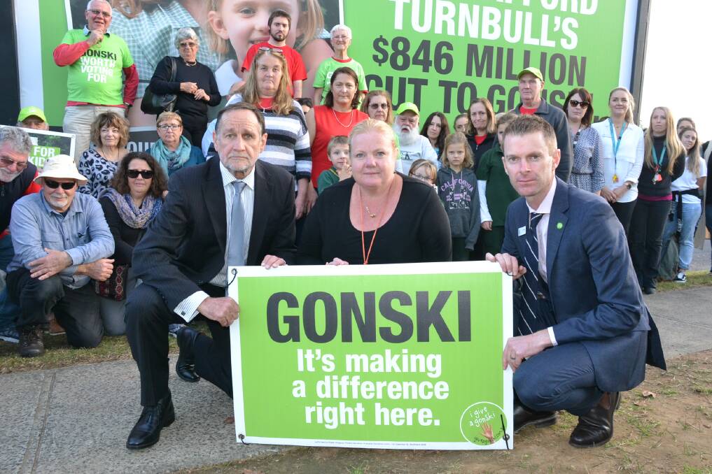 SUPPORT: Deputy president of the NSW Teachers Federation Gary Zadkovich, relieving Nowra East Public School principal Kristie Goldthorp and Teachers Federation rep John Black with concerned community members and teachers at Tuesday’s Gonski Billboard demonstration.