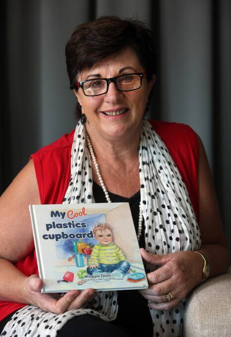 Maggie Dent with her first children's book, My Cool Plastics Cupboard. Picture: Robert Peet
