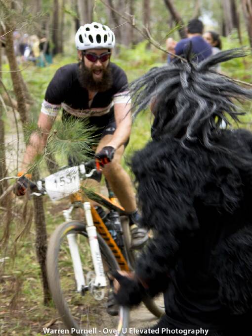 Brett Bellchambers gives a roar to one of the friendly gorillas of the Tathra MTB Enduro last year. 