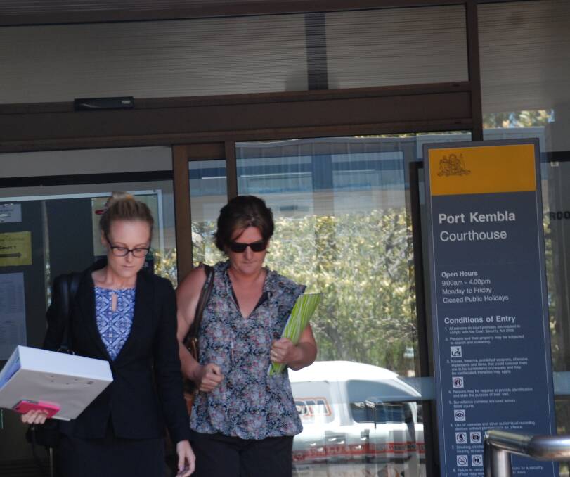 Millar departs the courthouse with her lawyer. Picture: Angela Thompson