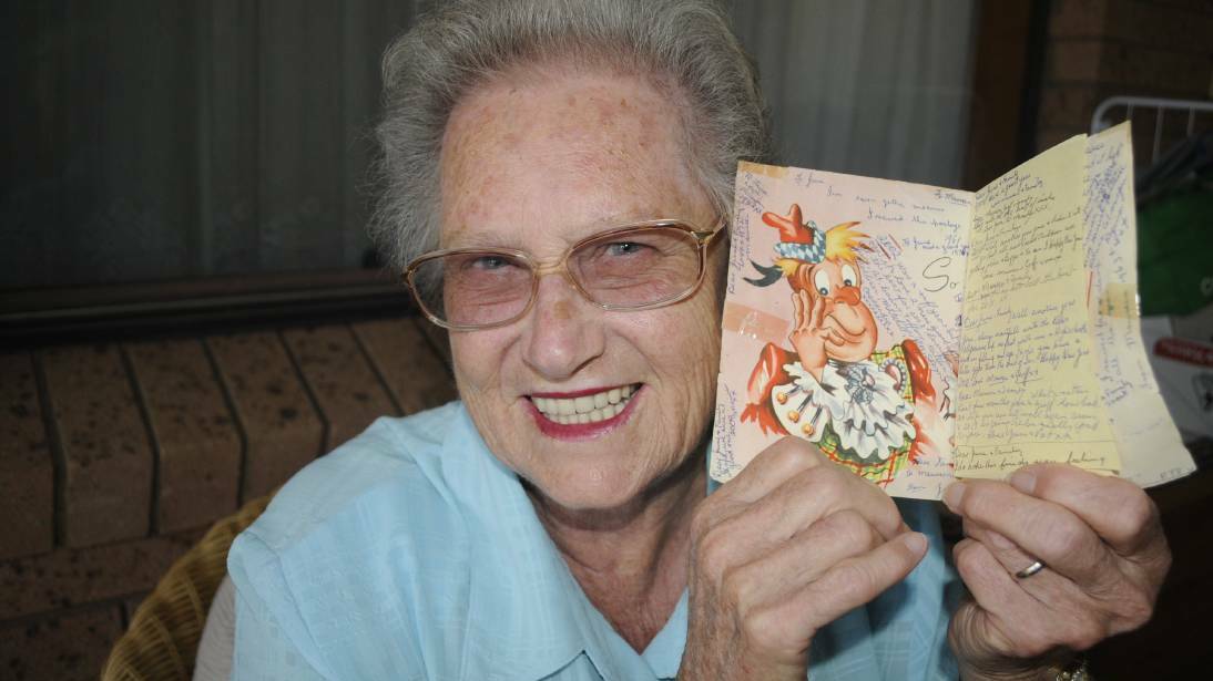 BACK AND FORTH: The same card has been sent back and forth between Bathurst's Maureen Clark (pictured) and her friend June Reedy in Forbes since 1957, with a new message added each time. 