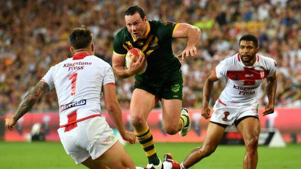 Boyd Cordner skips out of a tackle to launch himself at the try line before scoring the game's only try. Photo: AAP