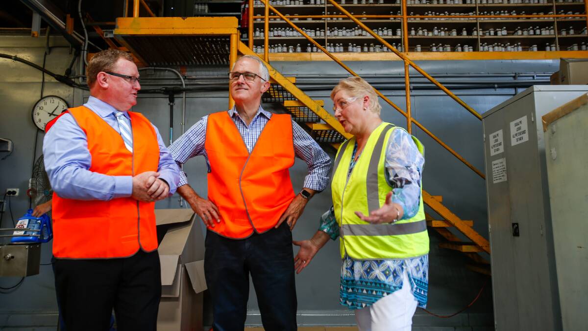 BUSINESS TALKS: Malcolm Turnbull and Gilmore MP Ann Sudmalis speak with NowChem managing director John Lamont during a visit to the chemical manufacturer.