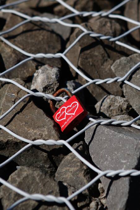 One of the older love locks still holding at the Sea Cliff Bridge -a popular spot for these padlocks of passion. 