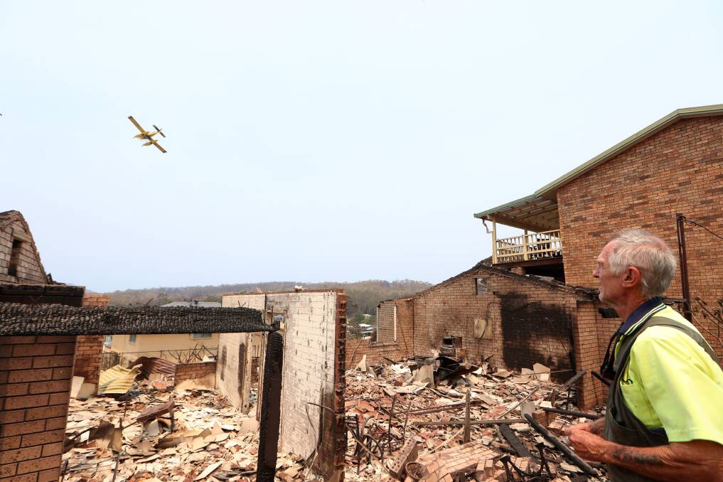 Conjola residents return to their fire-ravaged homes .. there is a call for insurance companies to process claims quickly. Picture: Sylvia Liber.