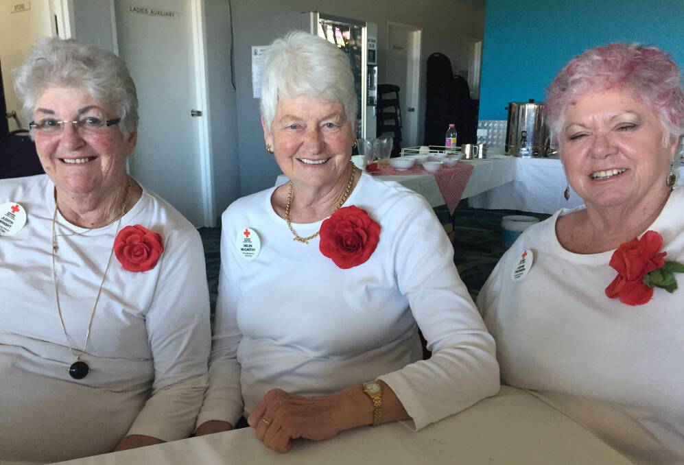 LOVELY: Judith Wright, Helen McCarthy and Leone Trudgen of the Vincentia branch are ready for their choir performance. 