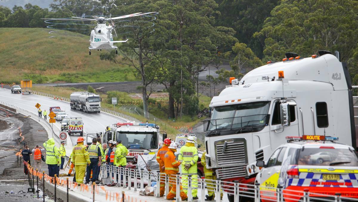 Emergency services at the crash site on the Princes Highway in Berry. Photo: Adam McLean.