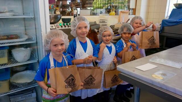 CHOCOLATE: North Nowra Gumnut Guides, Elara Thomas, Abby Benson, Scarlett Amey, Kate Greenwood and Katie Halliday with their treats to take home. 
