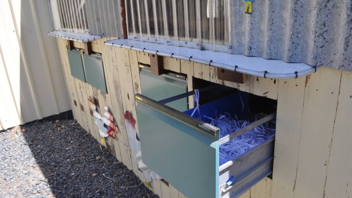 WASTE NOT, WANT NOT: Nothing went to waste when it came to the new chook resort - even filing cabinets have a role to play. 