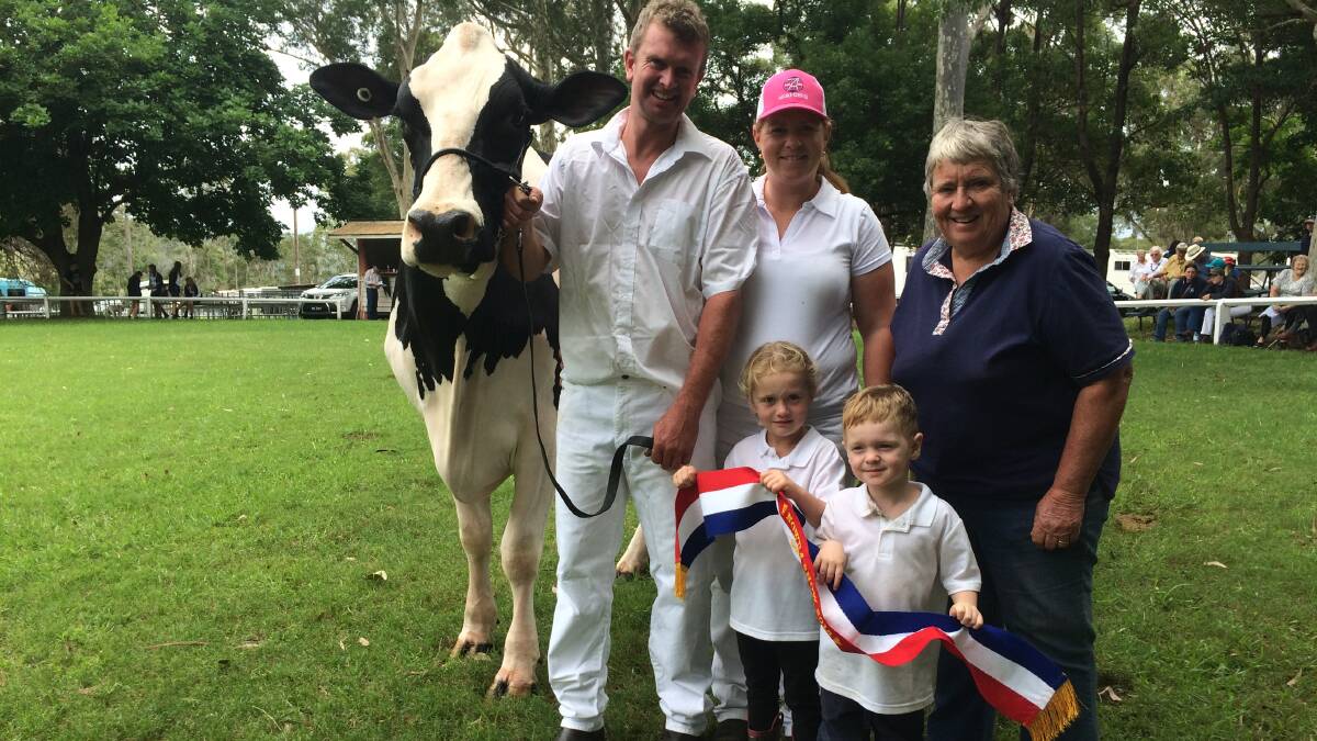 Andrew, Abbey, Lana, Harry and Jenny Crawford with 'Coolea Stormatic Bess' after winning the Champion Holstein Cow.