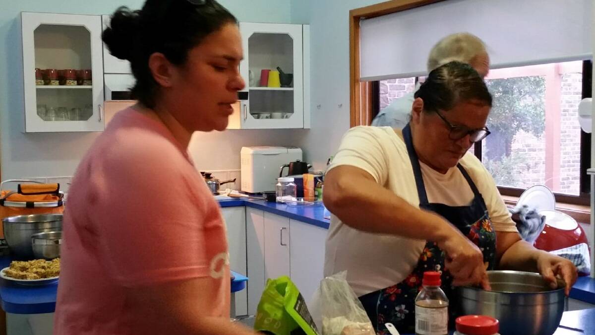 TEAM WORK: Joanna and Cecilia give a mother daughter cooking demonstration. Photo: contributed. 