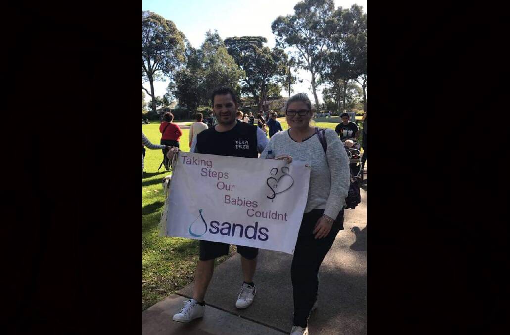 TAKING STEPS: Nicole Hampton and her fiance Josh Carstairs helped raise more than $1000 for Sands Australia during a fundraiser in Huskisson this year. 