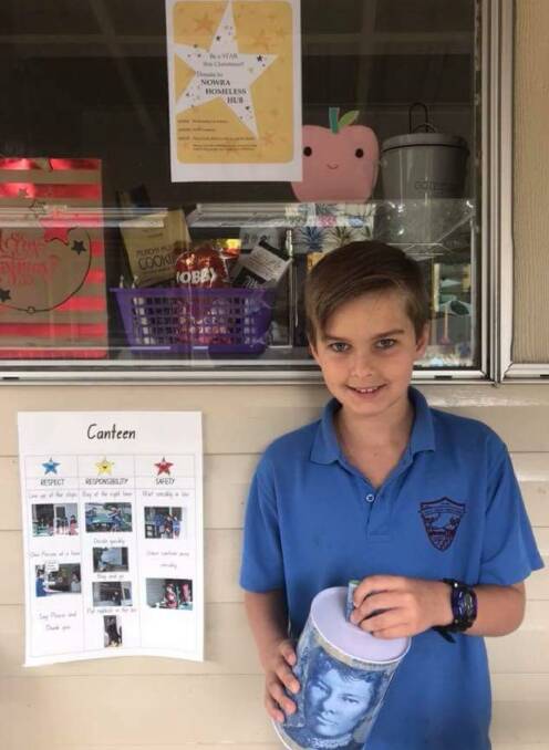 APPRECIATED: Falls Creek Public School student Angus Findlay helps collect money for the Homeless Hub. 