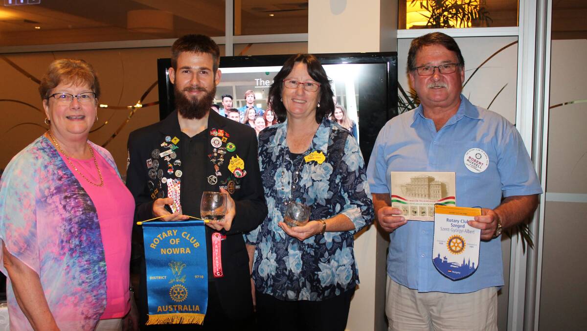 GUEST: Nowra Rotarian, Janice Aljancic (left), thanks Hungarian Rotary Exchange student Zsolt Hajdu wearing his official youth exchange jacket for his entertaining talk and Bomaderry Rotarian and Youth Exchange officer- Karen Trigg (second from right) for her support of him. Zsolt also exchanged club banners with Nowra Rotary president -  Rob Russell (right) and presented him with a souvenir gift pack of Hungarian matches.
 