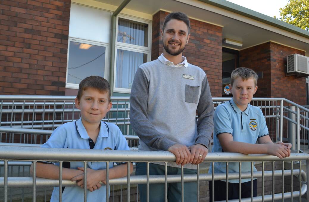 Students Zander Hardford and Tony Lonsdale with Bomaderry Public School teacher Ben Green. Ben is a former Bomaderry Public School student. 