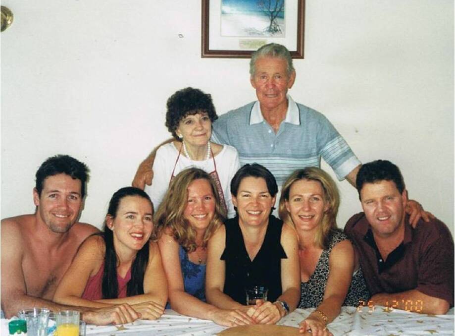 THEN: Russ and Jill Moran, pictured with their six children in 2000. Photo supplied. 