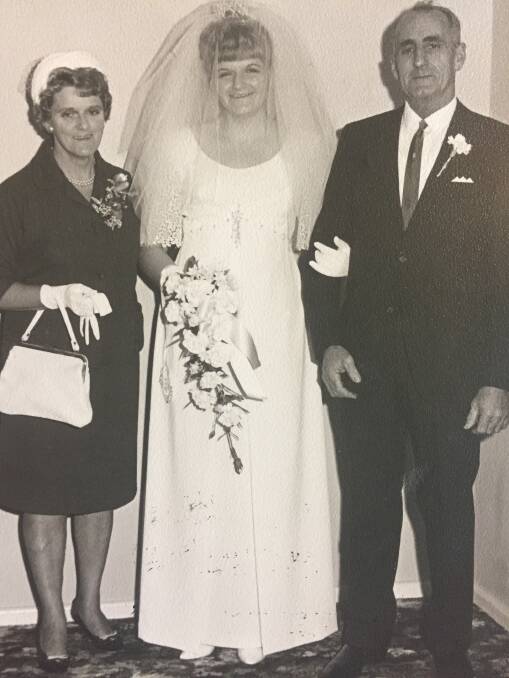 Bonnie with her parents on her wedding day in 1967. 