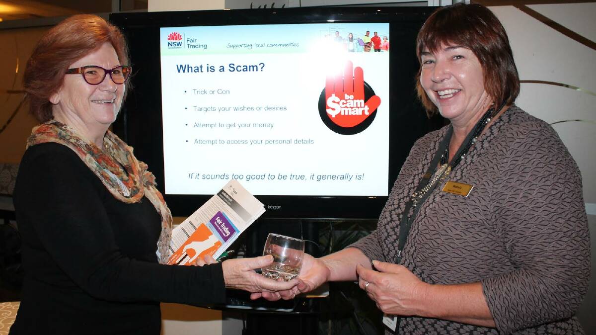 EYE-OPENING: New Nowra Rotarian Caroline Smart thanks Michella Veale from Department of Fair Trading for a very interesting talk on many scams reported to them daily.
