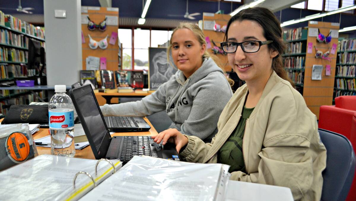 CRUNCH TIME: Danielle Parkes and Cailtin Gomes are one of many year 12 students across the region preparing for their HSC exams next week. The St John the Evangelist Catholic High School students will begin on Monday, October 12 with their English exams. 