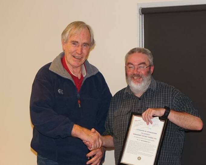 THANK YOU: Tim was presented with a Certificate of Appreciation by John Drinkwater.