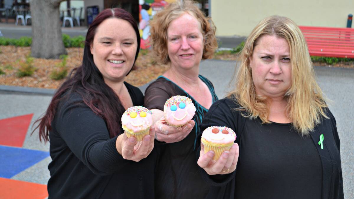 CUPCAKE DELIGHT: Bec Semovente, Helen Backhouse and Kylie Rayner prepare to bake up a storm ahead of the beyondblue bash on October 13.