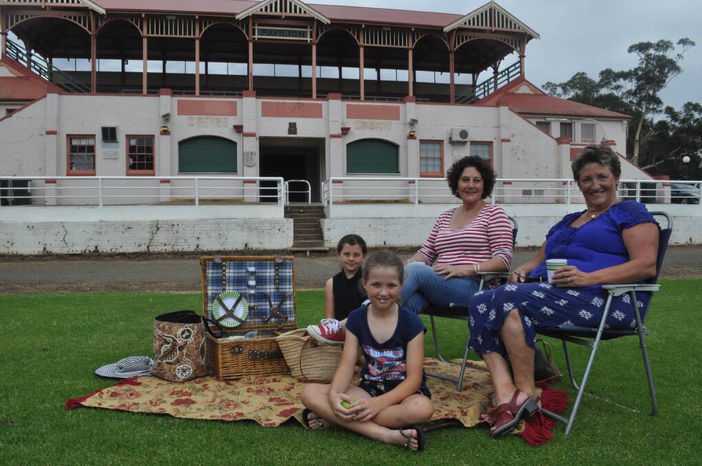ALL WELCOME: Hailey Cartwright, Ruby Hilkemeijer, Sheelagh Cameron and Sue Hammond-Warne are ready to roll out the picnic rug for the second annual One Voice Shoalhaven Picnic in the Park fundraiser. 