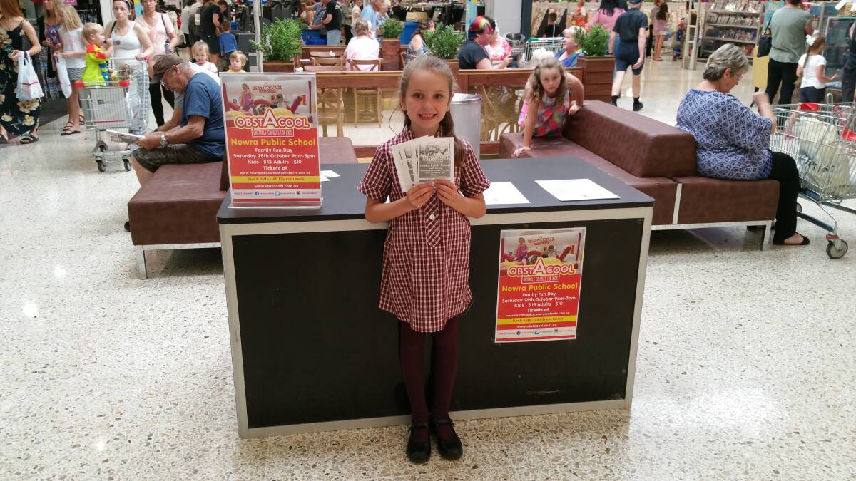 FUN AHEAD: Laylah Jamieson helps sell tickets for Obstacool. The year one Nowra Public School student encouraged everyone to grab their tickets and help support the school. Photo: contributed.
