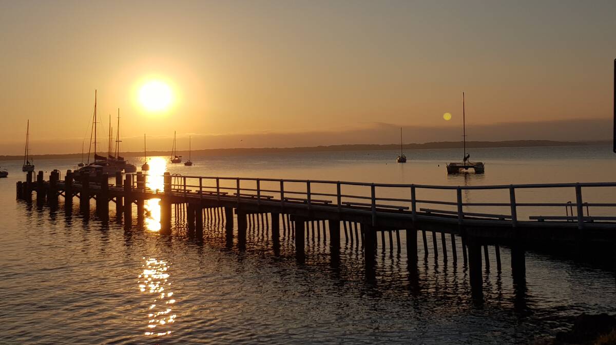 PIC OF THE DAY: Lyn Byrne captured a beautiful sunrise over Callala Bay wharf. Submit entries via nicolette.pickard@fairfaxmedia.com.au 