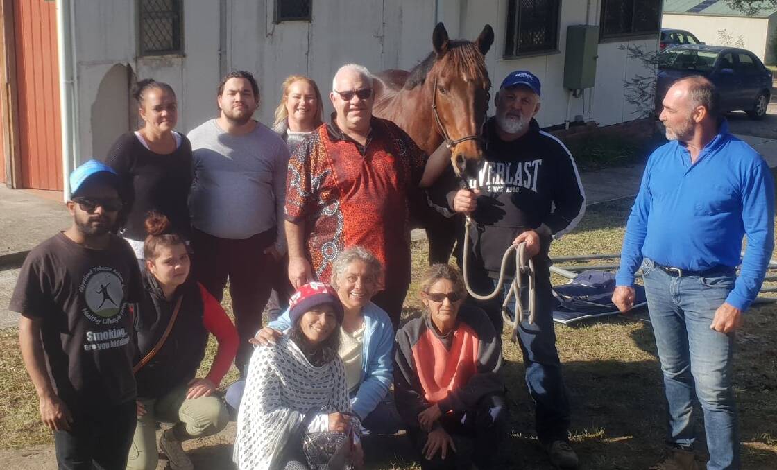 HORSES FOR COURSES: Greg Peterson (centre) and Scott Brodie (right) with participants in the Racing NSW Thoroughbred Retraining Program in Bomaderry on Tuesday. 
