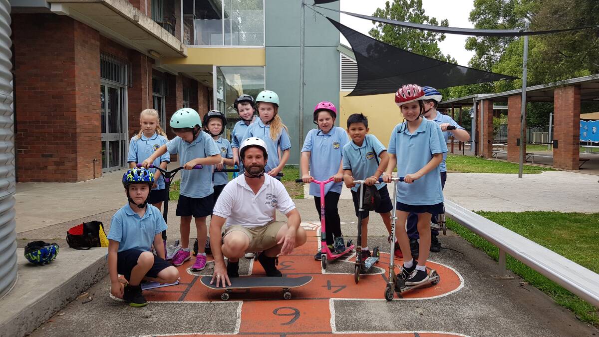 SAFETY FIRST: Cooper Martin, a Bomaderry High School student shared with young Bomaderry Public School students his experience after riding his skateboard without a helmet. Photo: Bomaderry Public School. 
