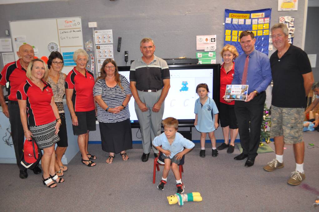 APPRECIATED: Variety South Coast members present Havenlee School P&C vice president and secretary Liam and Sharon Molloy, and students Noah Hobson and Destiny West with their new technology. 
