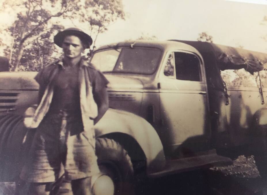 DARWIN BOMBINGS: The Shoalhaven's Ken Walker with his truck in Darwin in 1942. Photo: Shoalhaven Historical Society. 