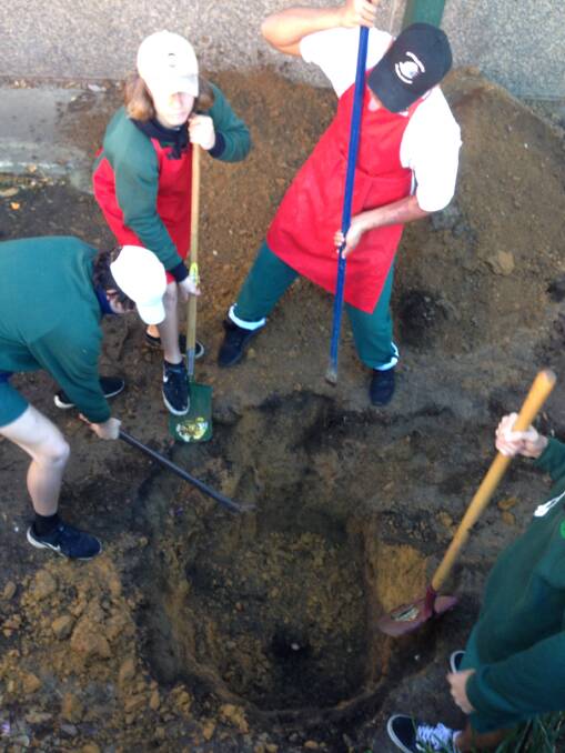 HISTORY: Bomaderry High School students uncover a time capsule buried 37 years ago.

