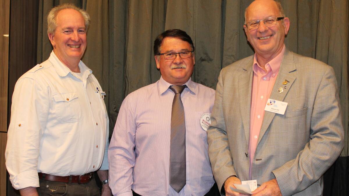 MOVING FORWARD: Rotary South Nowra President Michael Temby and Rotary Nowra President Rob Russell thank Rotary District 9710 Governor Steve Hill for his encouraging talks to Shoalhaven Rotarians.