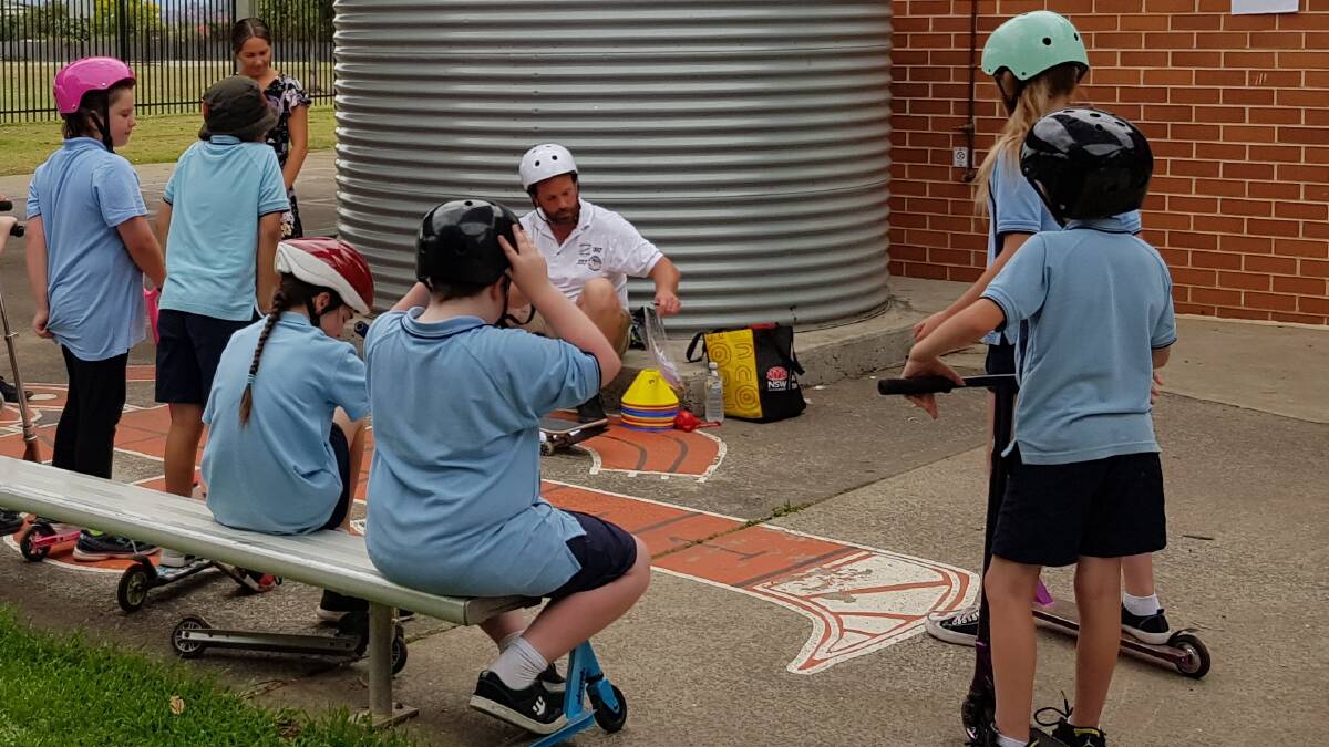 The students vowed to always remember 'Cooper's Promise', which is to always wear a helmet when riding a bike, scooter or skateboard. 