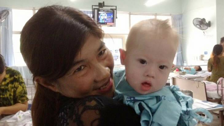 Gammy with his great-grandmother in a Thai hospital ward.