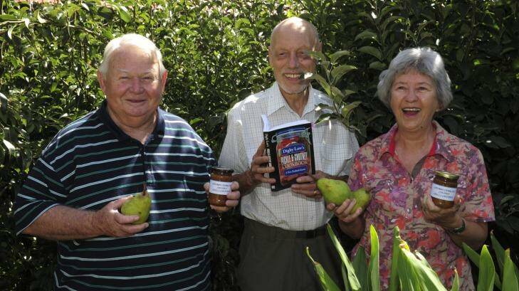  Latham residents and choko fans (from left) Charlie Watson, Charlie Lewis and Helen Lewis in Watson's backyard.  Photo: Graham Tidy