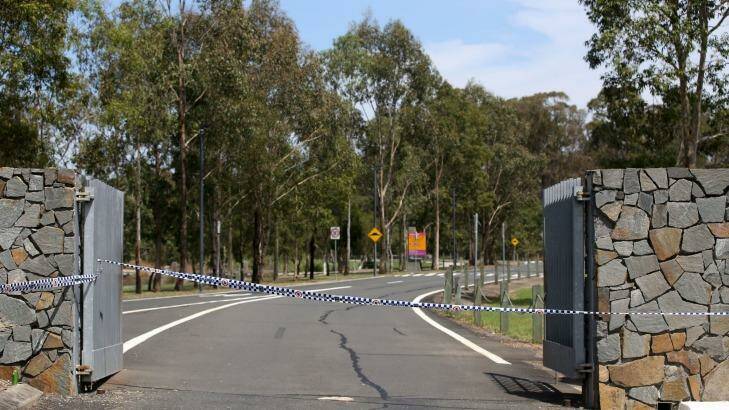 Police cordon off the entrance to Lizard Log Park, Wetherill Park following the shootings. Photo: James Alcock