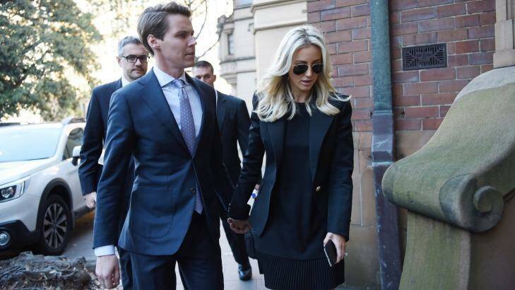 Oliver Curtis and wife Roxy Jacenko arrive at St James Court on Thursday. Photo: Nick Moir