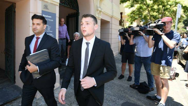 Jordan Duffy, 19, (right) leaves Newtown Local Court with barrister Arjun Chhabra on Thursday.  Photo: Peter Rae